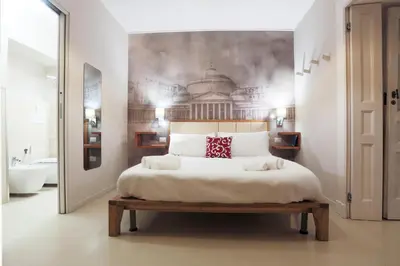 Letto o letti in una camera di Fate Foria Style House