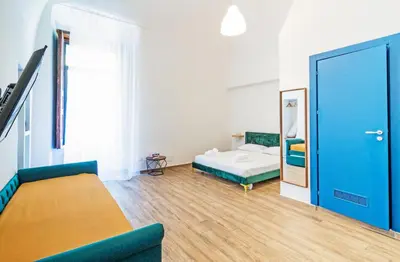 Letto o letti in una camera di Palazzo Belmosto