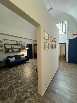 Letto o letti in una camera di Palazzo Belmosto