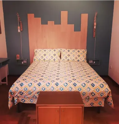 Letto o letti in una camera di Intrecci & Impasti