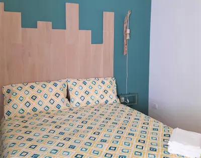 Letto o letti in una camera di Intrecci & Impasti