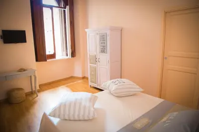 Letto o letti in una camera di I Racconti di Partenope