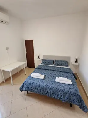 Letto o letti in una camera di Spaccanapoli house