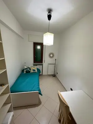 Letto o letti in una camera di Dimora Anema e Core
