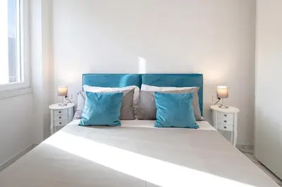 Letto o letti in una camera di Tema Suites - Dimore Partenopee