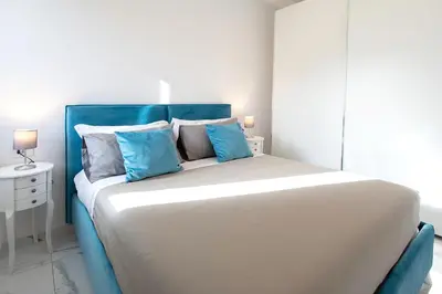 Letto o letti in una camera di Tema Suites - Dimore Partenopee