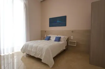 Letto o letti in una camera di Leone Suites Toledo
