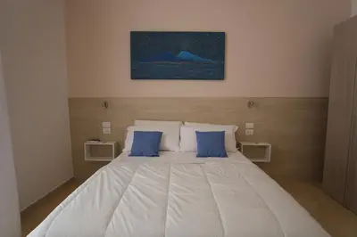 Letto o letti in una camera di Leone Suites Toledo