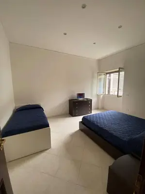 Letto o letti in una camera di Holiday House Duomo 202