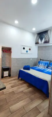 Letto o letti in una camera di Rosy Maison