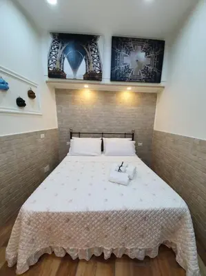 Letto o letti in una camera di Rosy Maison