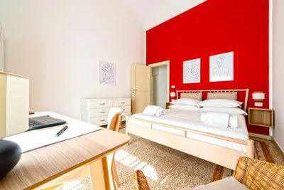 Letto o letti in una camera di Casa Palazzo Dini Family-Friends Apartment - By Gocce Team
