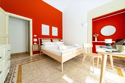 Letto o letti in una camera di Casa Palazzo Dini Family-Friends Apartment - By Gocce Team