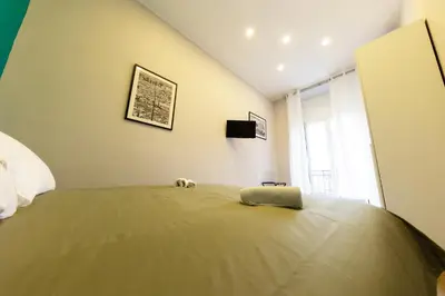 Letto o letti in una camera di A CASA DI PUPA GUEST HOUSE
