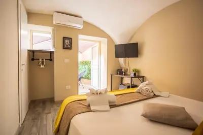 Letto o letti in una camera di Pendino Rooms