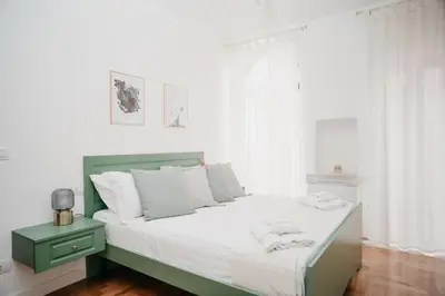 Letto o letti in una camera di Vista Napoli Residence by Casa Napoletana