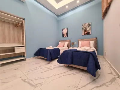 Letto o letti in una camera di Riben home