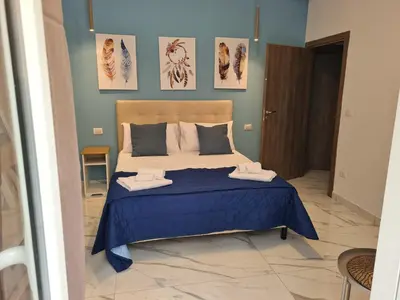 Letto o letti in una camera di Riben home