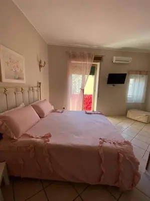 Letto o letti in una camera di Una terrazza al centro 2