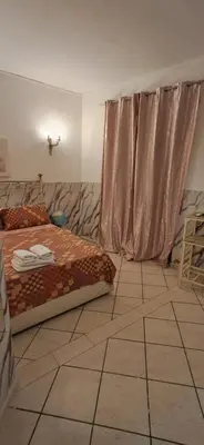 Letto o letti in una camera di Una terrazza al centro 2