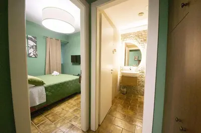 Letto o letti in una camera di Flowers House casa vacanze