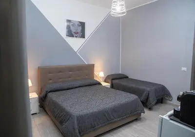 Letto o letti in una camera di zuroli suite