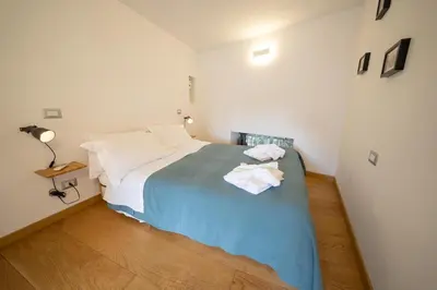 Letto o letti in una camera di Andrea's Home By Dimorra