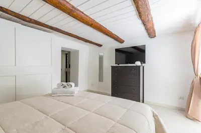 Letto o letti in una camera di Umberto's Nest at Toledo