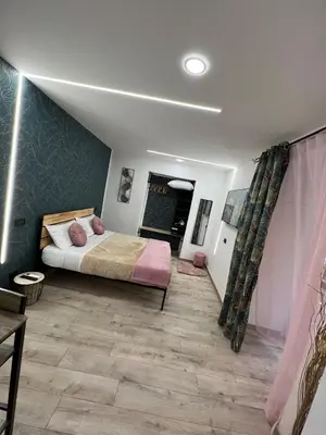 Letto o letti in una camera di I Sogni di CaBi