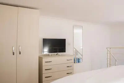 Letto o letti in una camera di La Casa del Duca
