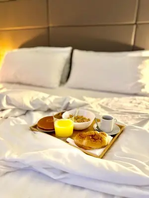 Letto o letti in una camera di NapoliOn - Luxury Apartment
