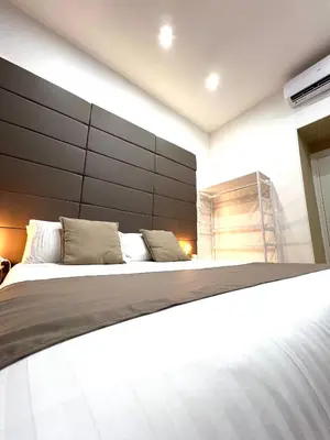 Letto o letti in una camera di NapoliOn - Luxury Apartment