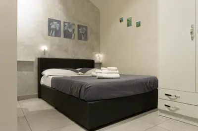 Letto o letti in una camera di Casa Ninarella
