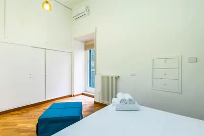 Letto o letti in una camera di Casa Fiorita alla Riviera by Napoliapartments