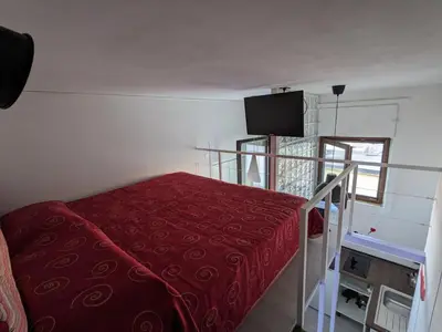 Letto o letti in una camera di Napoli City Panorama