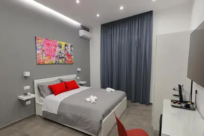 Letto o letti in una camera di Napolitan Pop House