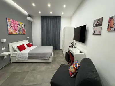 Letto o letti in una camera di Napolitan Pop House