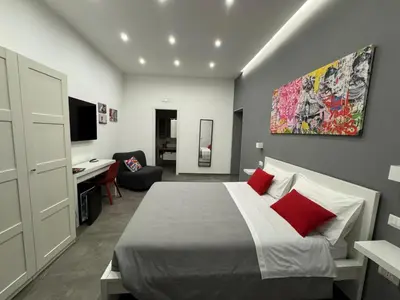 Letto o letti in una camera di Napolitan Pop House