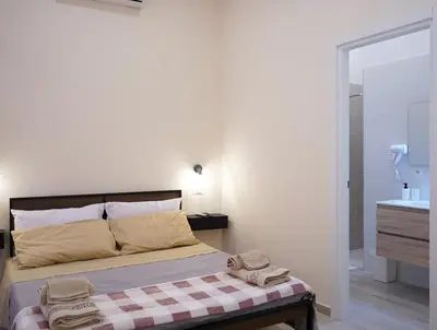 Letto o letti in una camera di Giulia's Home
