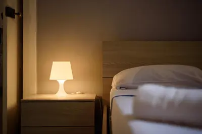 Letto o letti in una camera di Via Atri 37