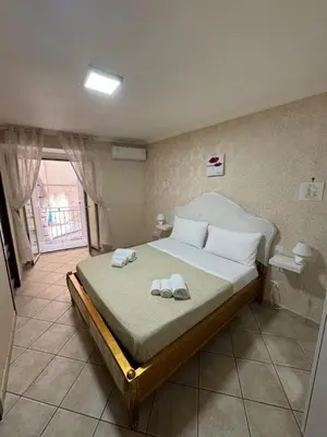 Letto o letti in una camera di Vittoria's home near Maradona mural