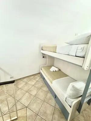 Letto o letti in una camera di Vittoria's home near Maradona mural