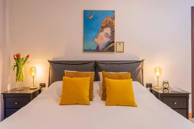Letto o letti in una camera di Daymoon House Merliani, Vomero