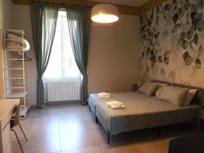 Letto o letti in una camera di Terrazza il Miglio