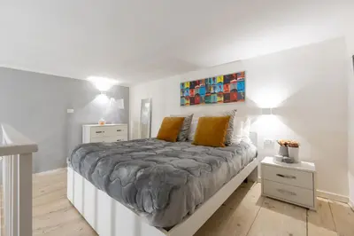 Letto o letti in una camera di Appartamento Via Toledo 55 - Palazzo della Porta