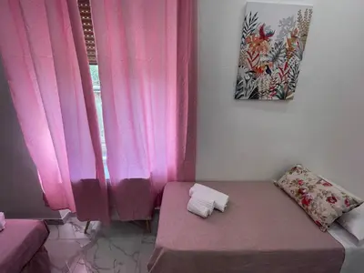 Letto o letti in una camera di Napoli Loves Sanità