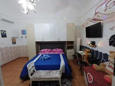 Letto o letti in una camera di la casetta di ciacione piazza del plebiscito