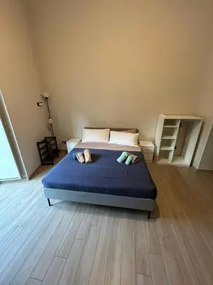 Letto o letti in una camera di Cosy Domy Apartments