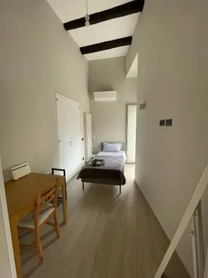 Letto o letti in una camera di Cosy Domy Apartments