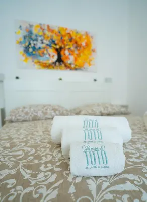 Letto o letti in una camera di La casa di Toto